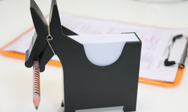 desk accessory, office supplies, stationery, pencil holder, note holder, creative design, donkey shape, workspace, office organization, memo pad, paper holder, quirky decor, black desk item, home office, desktop tool, school supplies, fun design, work desk, writing tools, office decor, modern office, to-do list, animal design, functional decor, productivity